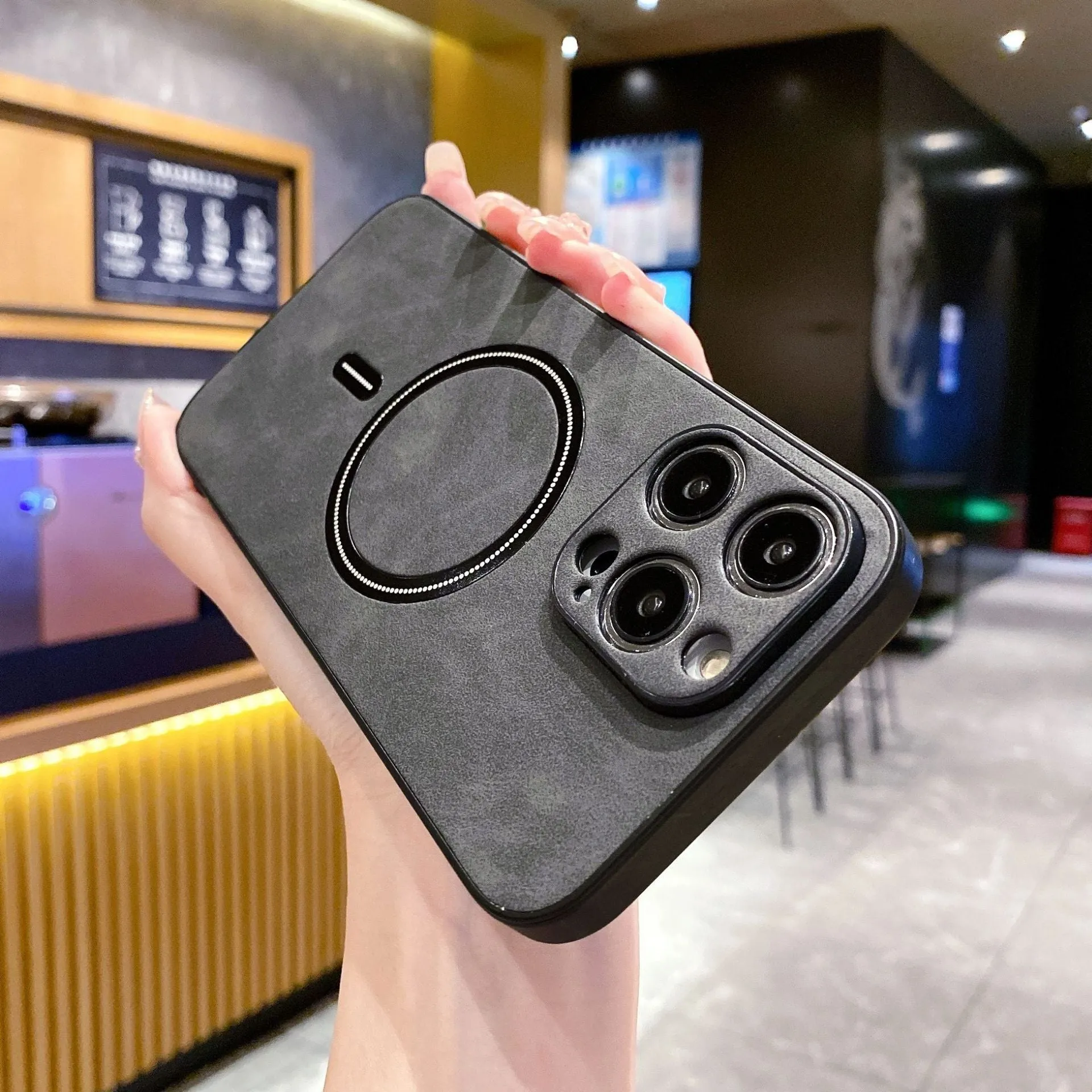 Magnetic PC phone case for iPhone in dark gray with camera cutout and raised edges