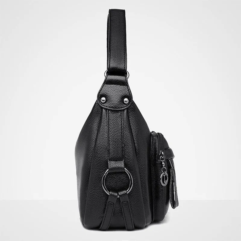 Large black women's crossbody shoulder bag with multiple internal compartments and zip closure