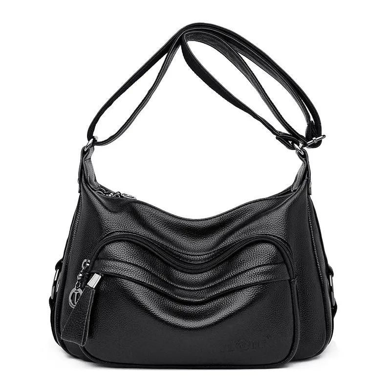 Large black women's crossbody shoulder bag with multiple internal compartments and zip closure