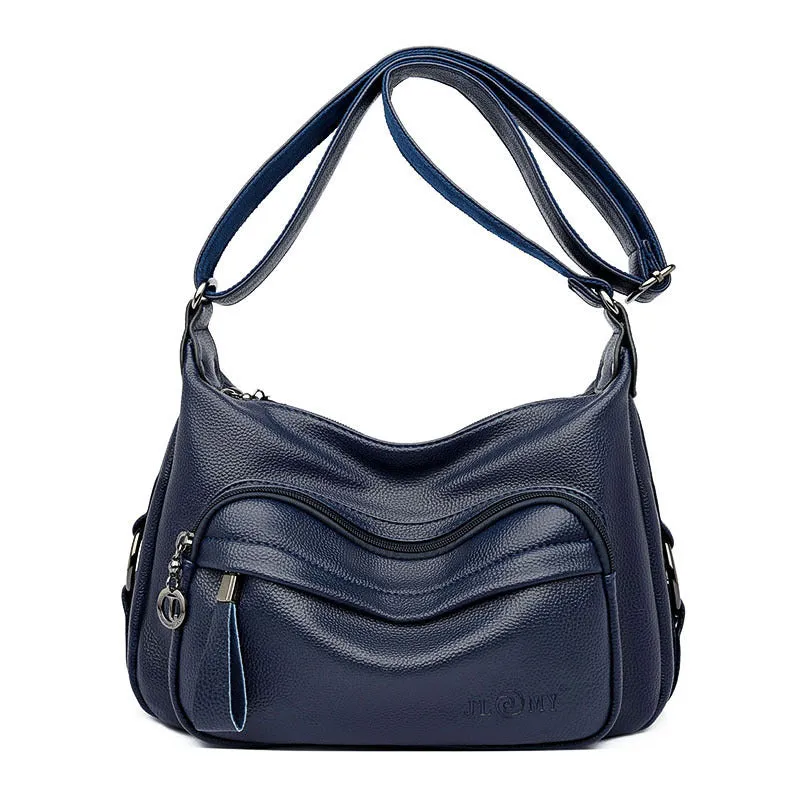 Large black women's crossbody shoulder bag with multiple internal compartments and zip closure