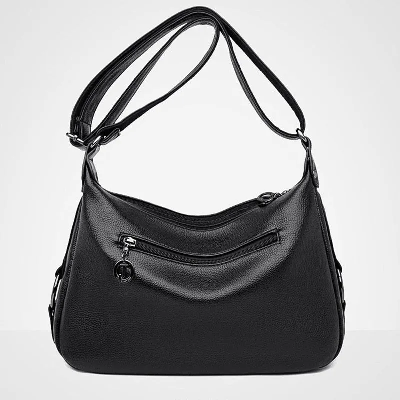 Large black women's crossbody shoulder bag with multiple internal compartments and zip closure