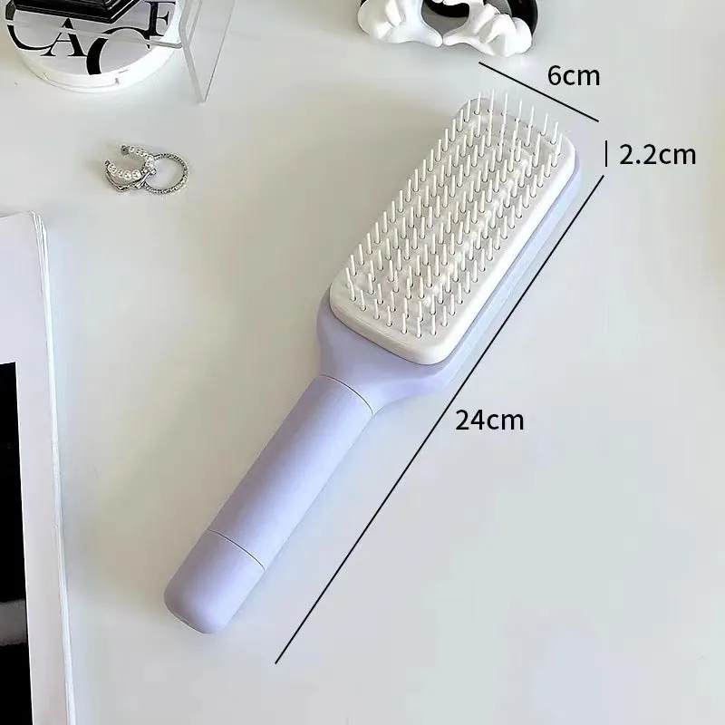 Purple self-cleaning hair brush with rotating handle and massage comb bristles