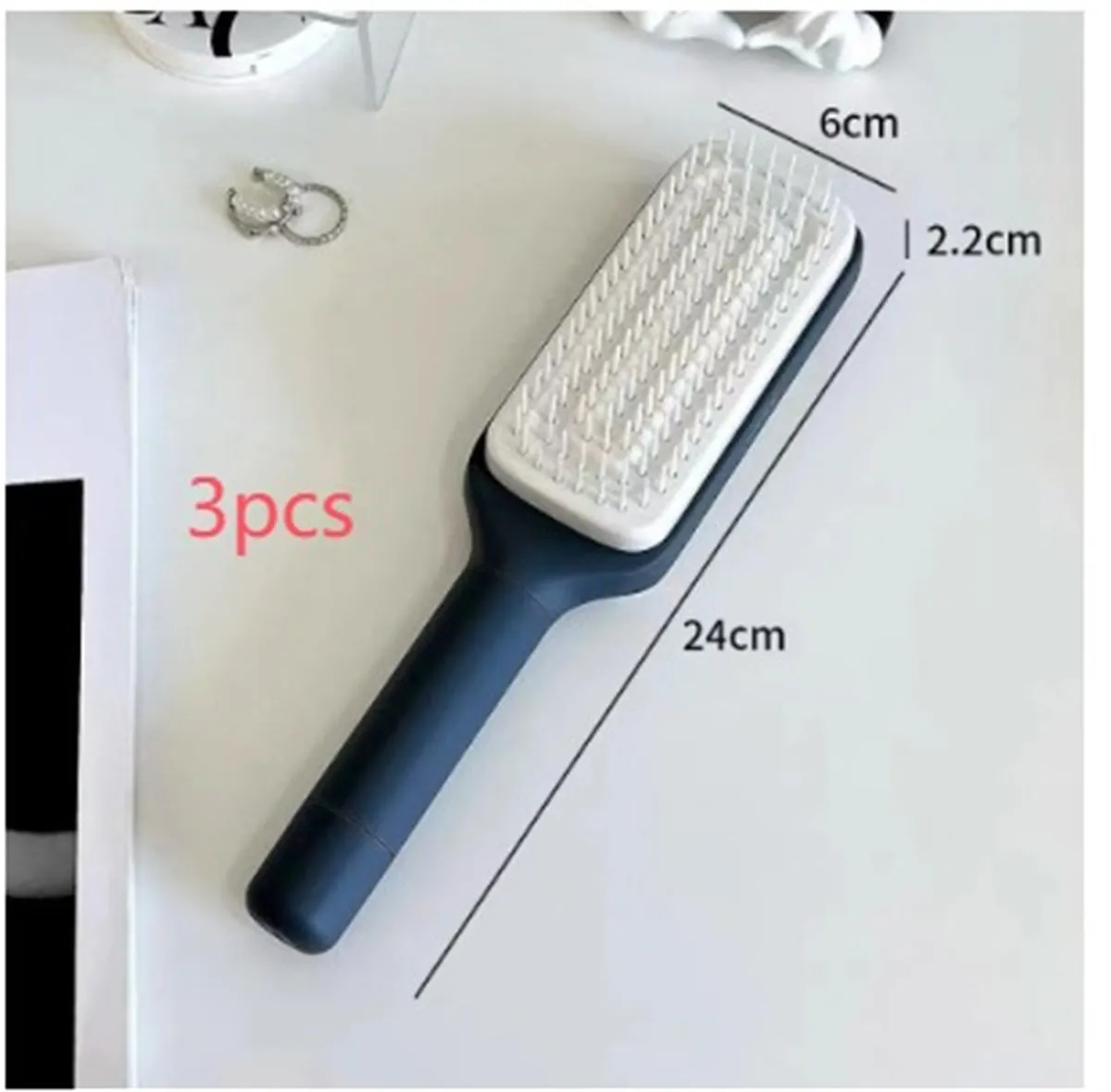 Purple self-cleaning hair brush with rotating handle and massage comb bristles