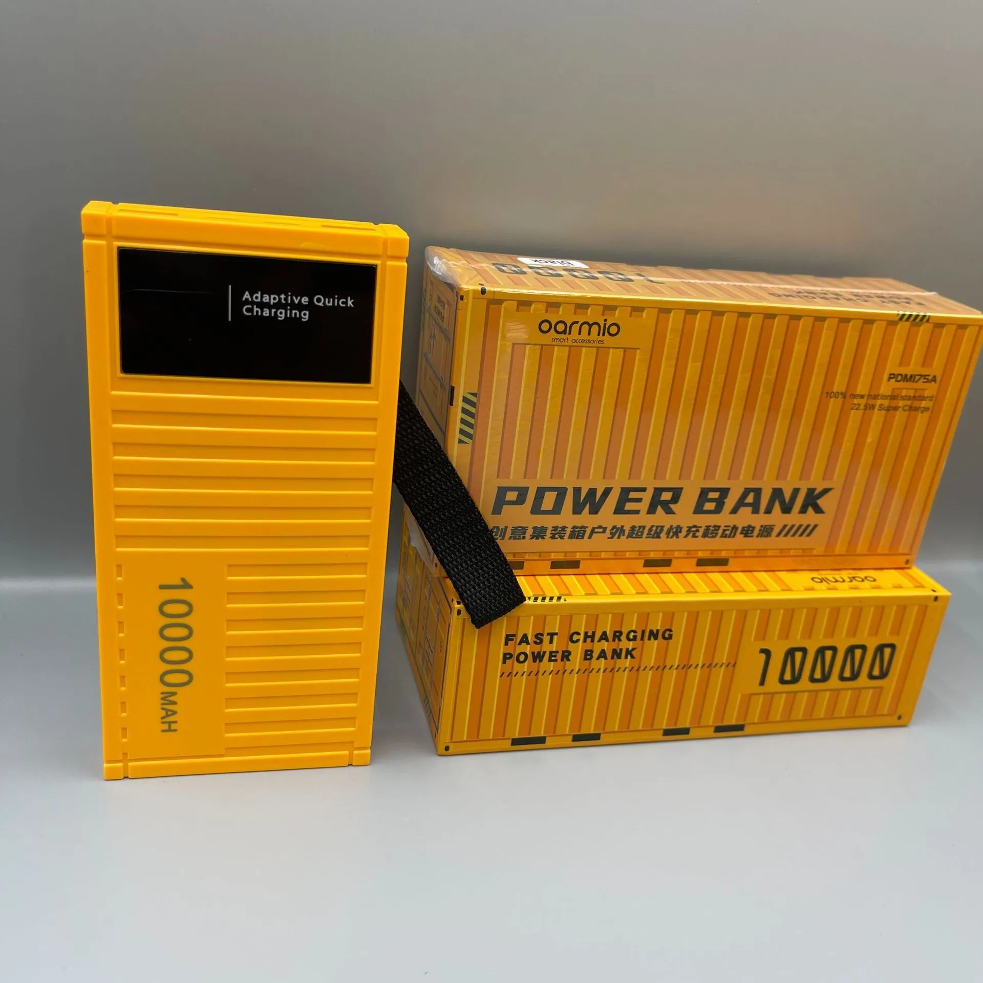 50000mAh black power bank with digital display, PVC shell, compact 145x70x65mm size