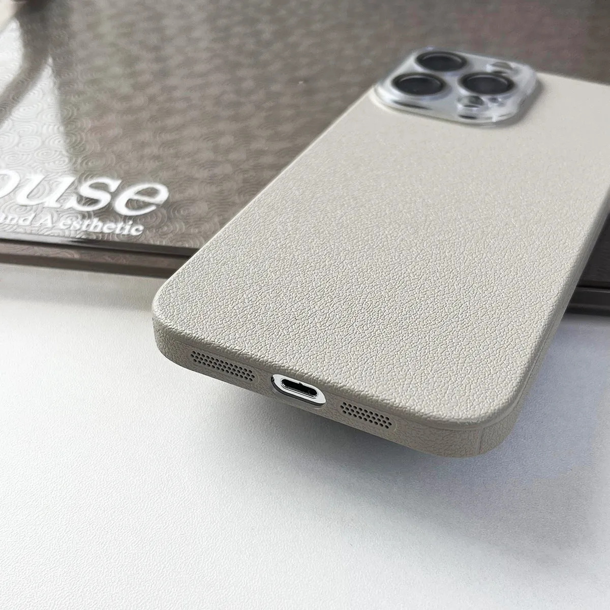 Solid colour lychee pattern PC phone case with anti-fall and anti-fingerprint properties, available in multiple colours