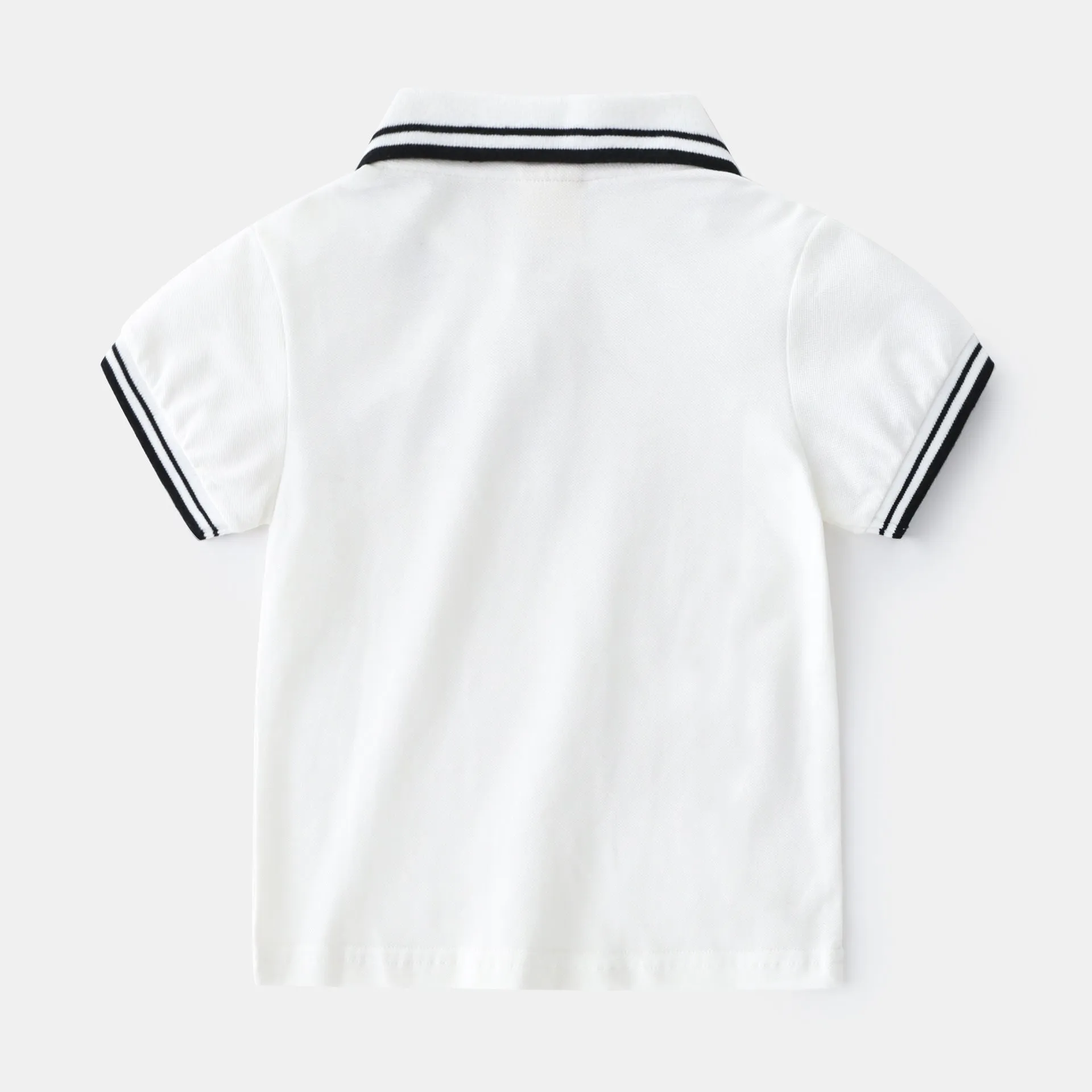 Boys' plain white and black short-sleeve cotton polo shirts for summer.