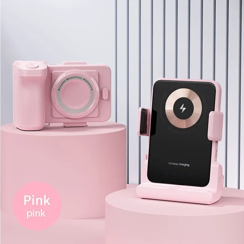 Plastic wireless charging magnetic phone holder in pink with USB cable on desk