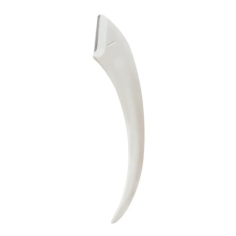 Curved moon-shaped eyebrow trimmer with a cutting comb on a white background.