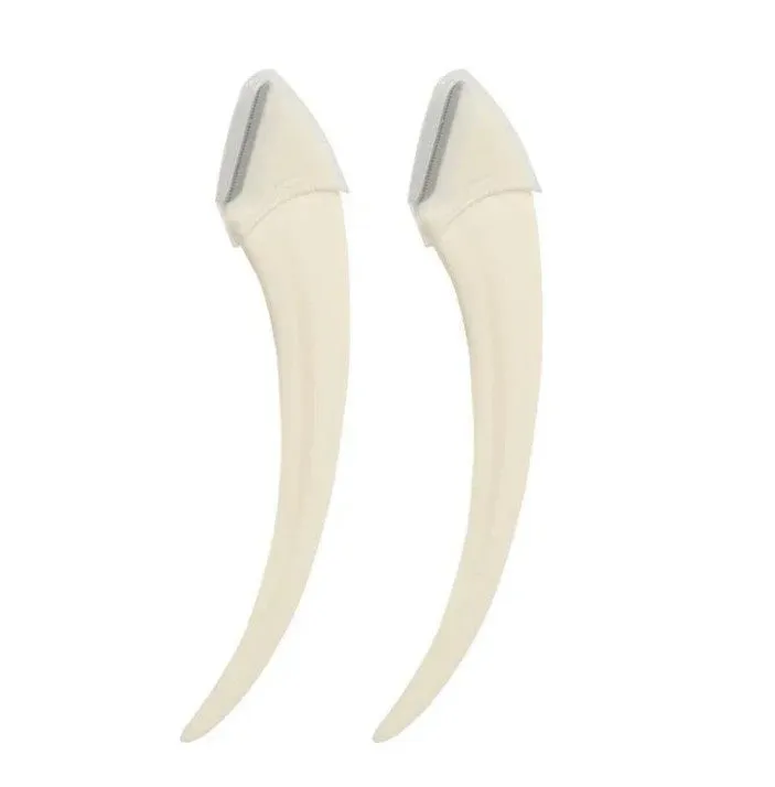 Curved moon-shaped eyebrow trimmer with a cutting comb on a white background.