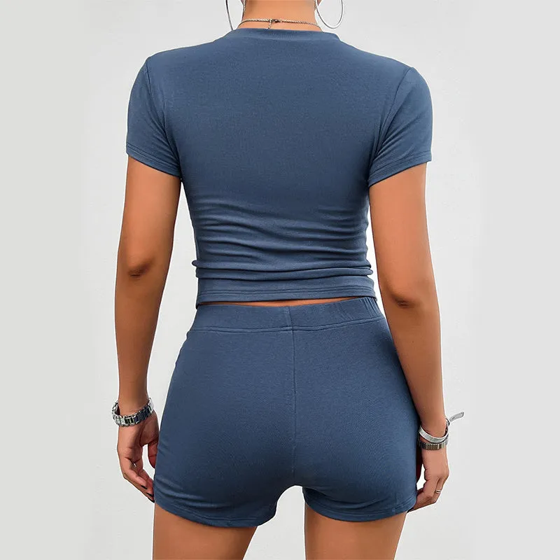 Women's solid colour viscose sports set with short sleeve t-shirt and elastic waist shorts.