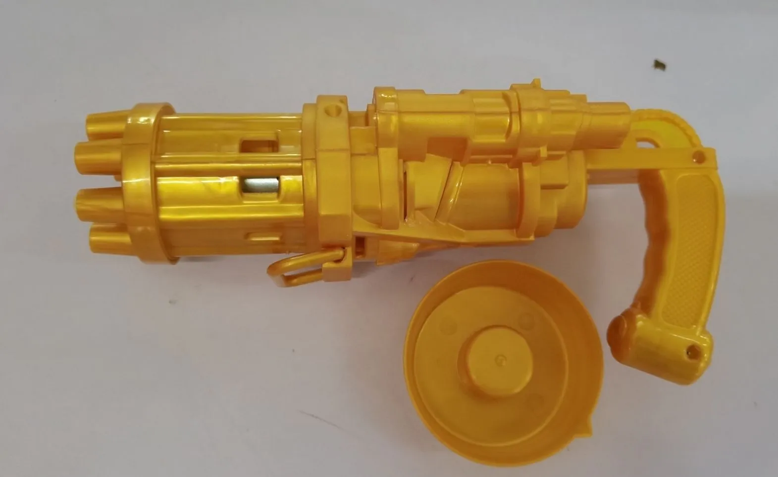 Children's bubble machine toy with machine gun design in pink, gold, or black colours