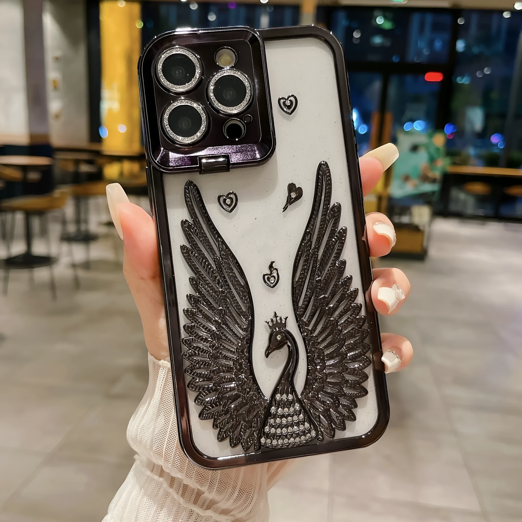 Angel wing frame bracket electroplated TPU phone case in transparent black for iPhone 15 Pro Max with built-in stand