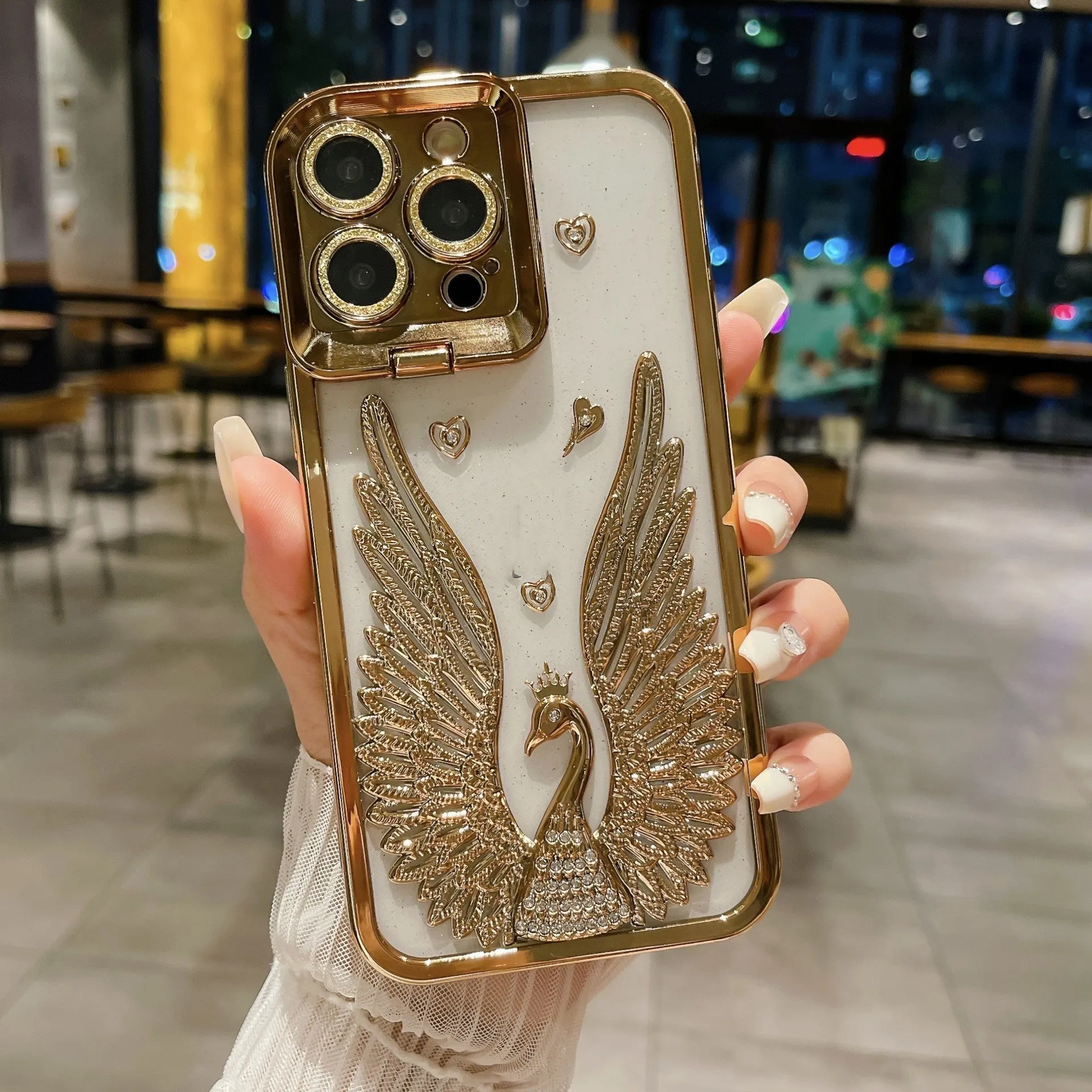 Angel wing frame bracket electroplated TPU phone case in transparent black for iPhone 15 Pro Max with built-in stand