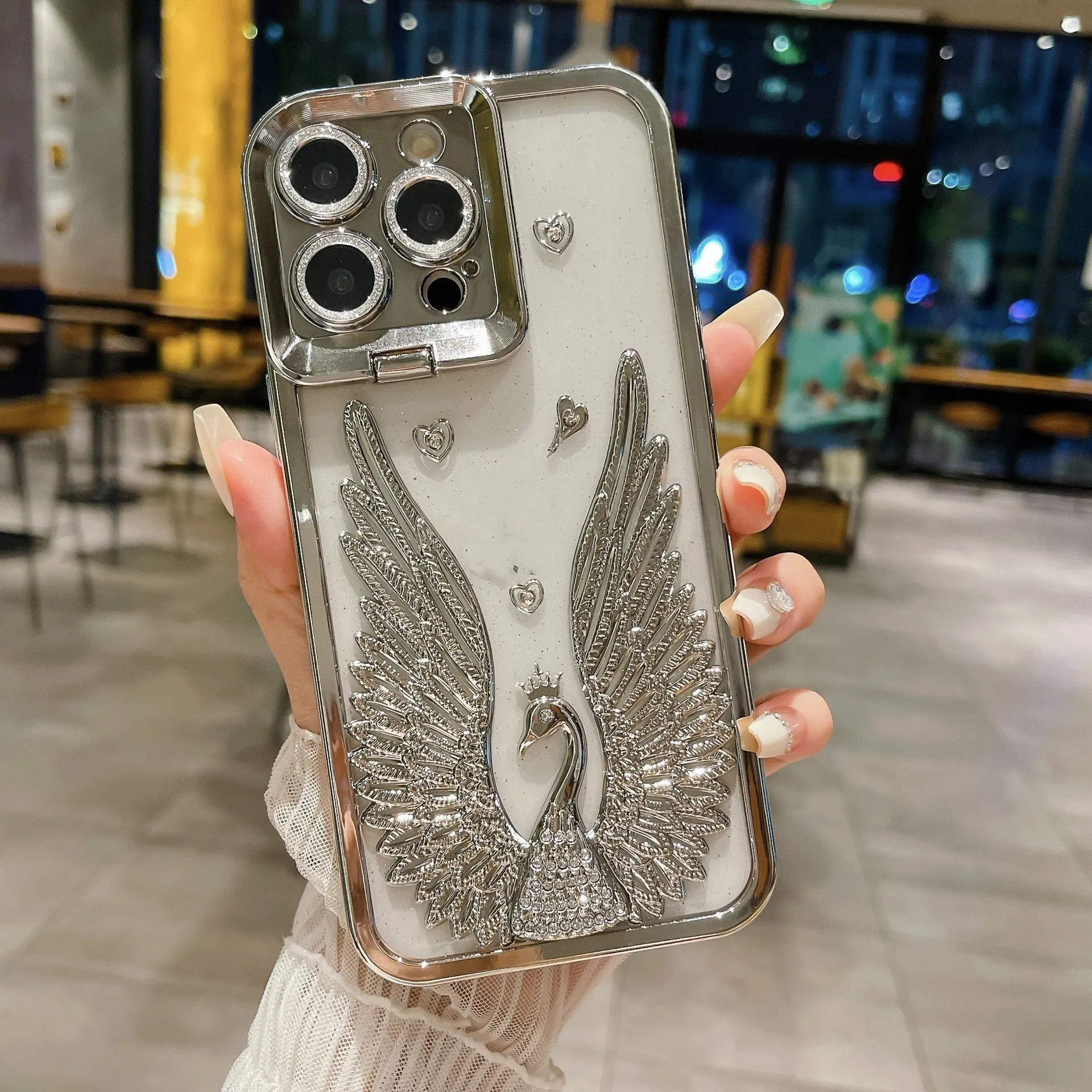 Angel wing frame bracket electroplated TPU phone case in transparent black for iPhone 15 Pro Max with built-in stand