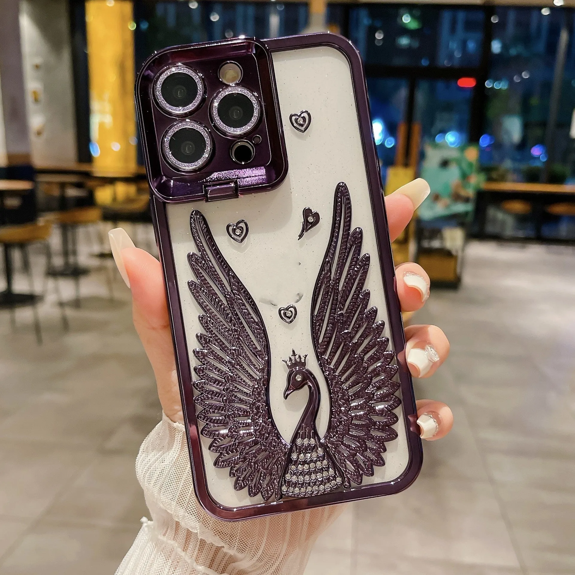 Angel wing frame bracket electroplated TPU phone case in transparent black for iPhone 15 Pro Max with built-in stand