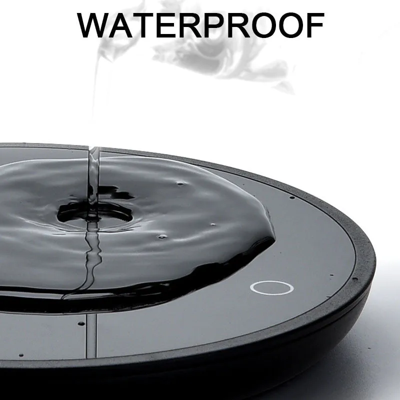 Black cup warmer with tempered glass surface and adjustable temperature control