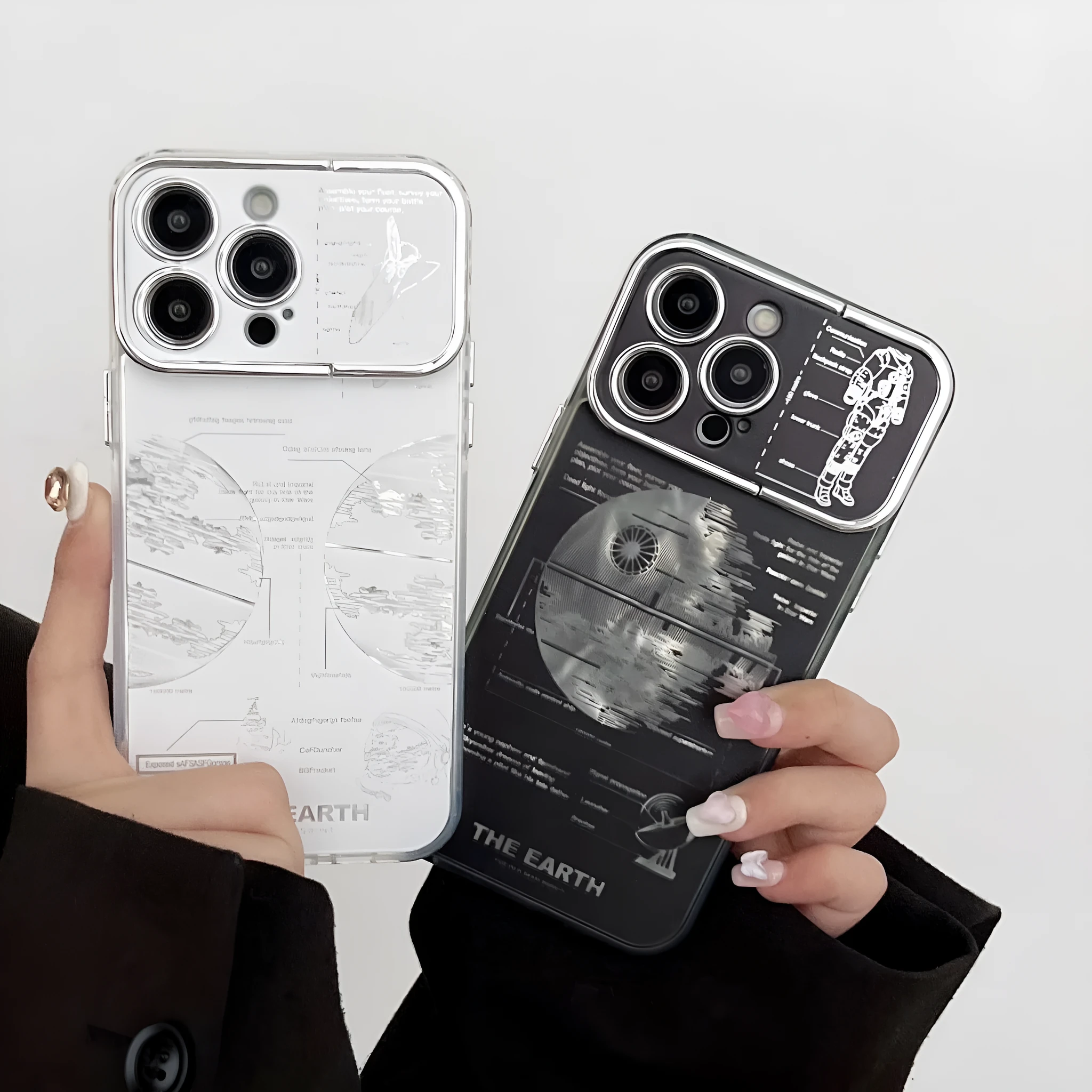 Pleated bracket TPU phone case with metal planet design for iPhone 14 Pro, two colour options shown