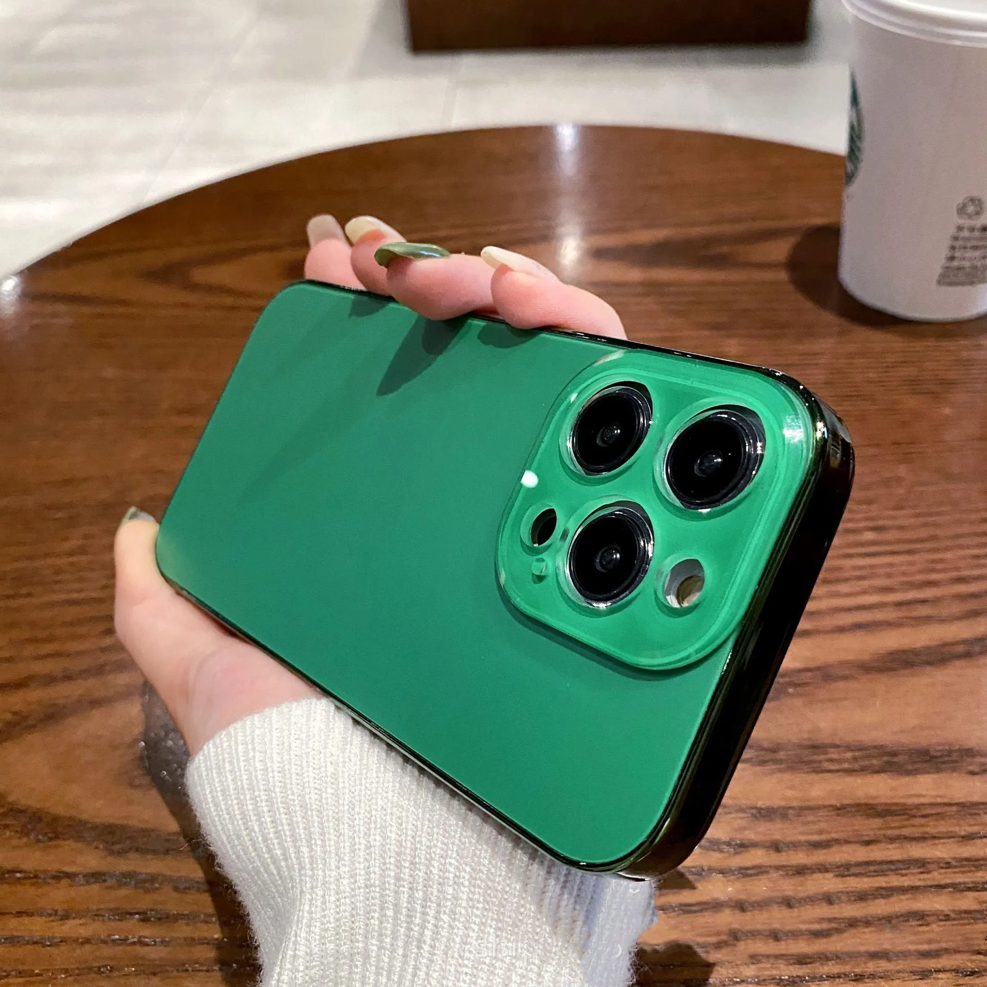 Electroplated TPU frosted acrylic phone case with matte finish for iPhone 11-14 series, showing black front and back against a neutral background