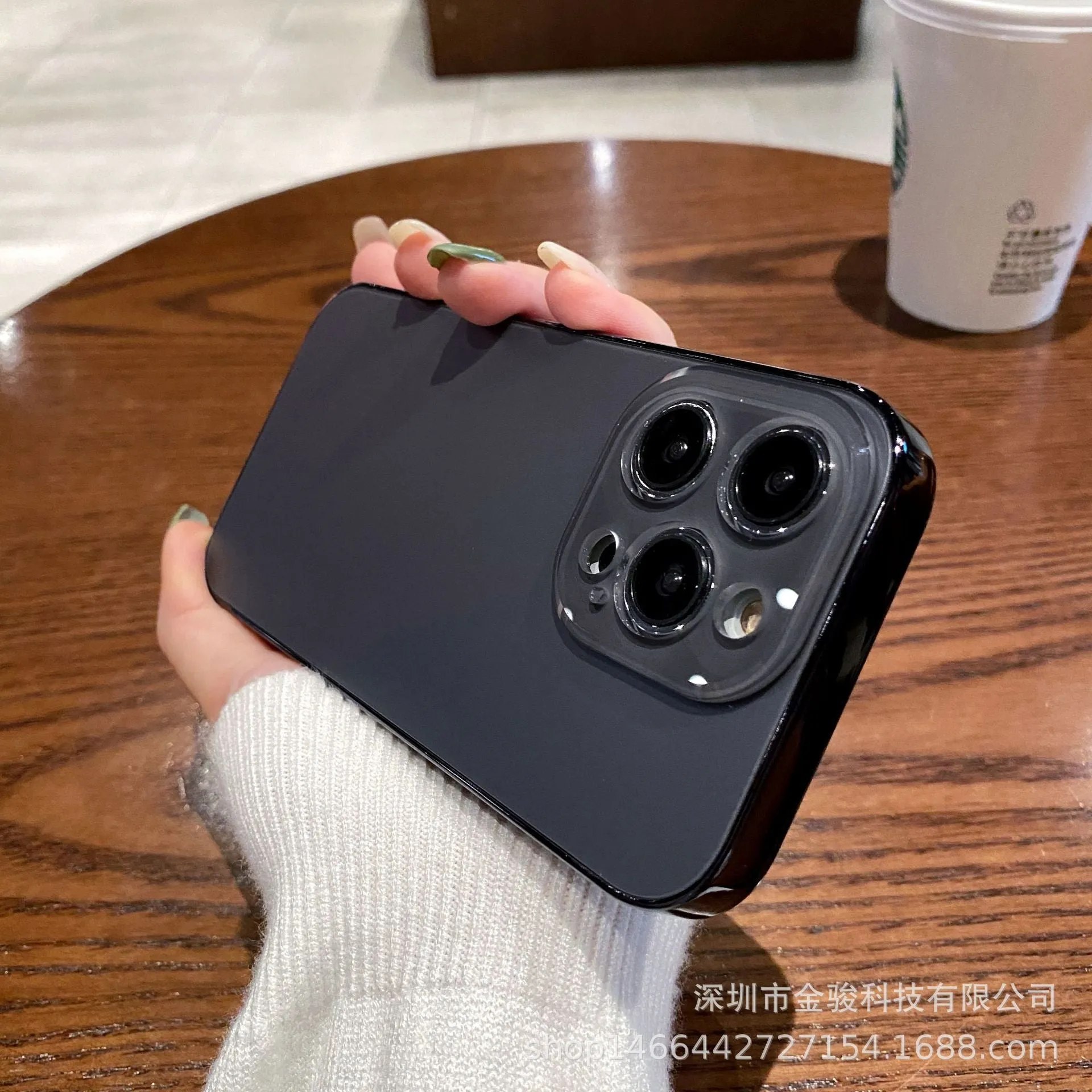 Electroplated TPU frosted acrylic phone case with matte finish for iPhone 11-14 series, showing black front and back against a neutral background