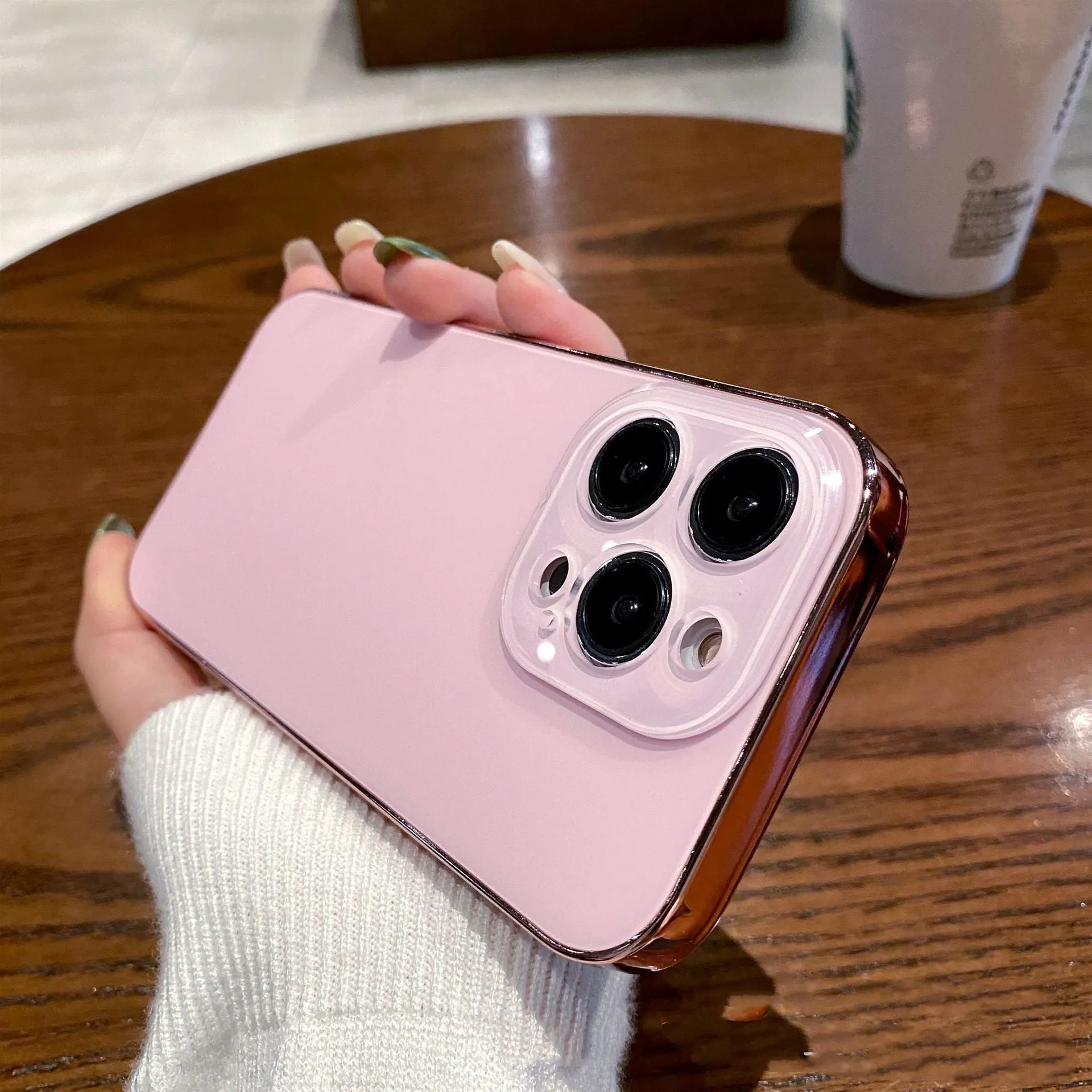 Electroplated TPU frosted acrylic phone case with matte finish for iPhone 11-14 series, showing black front and back against a neutral background