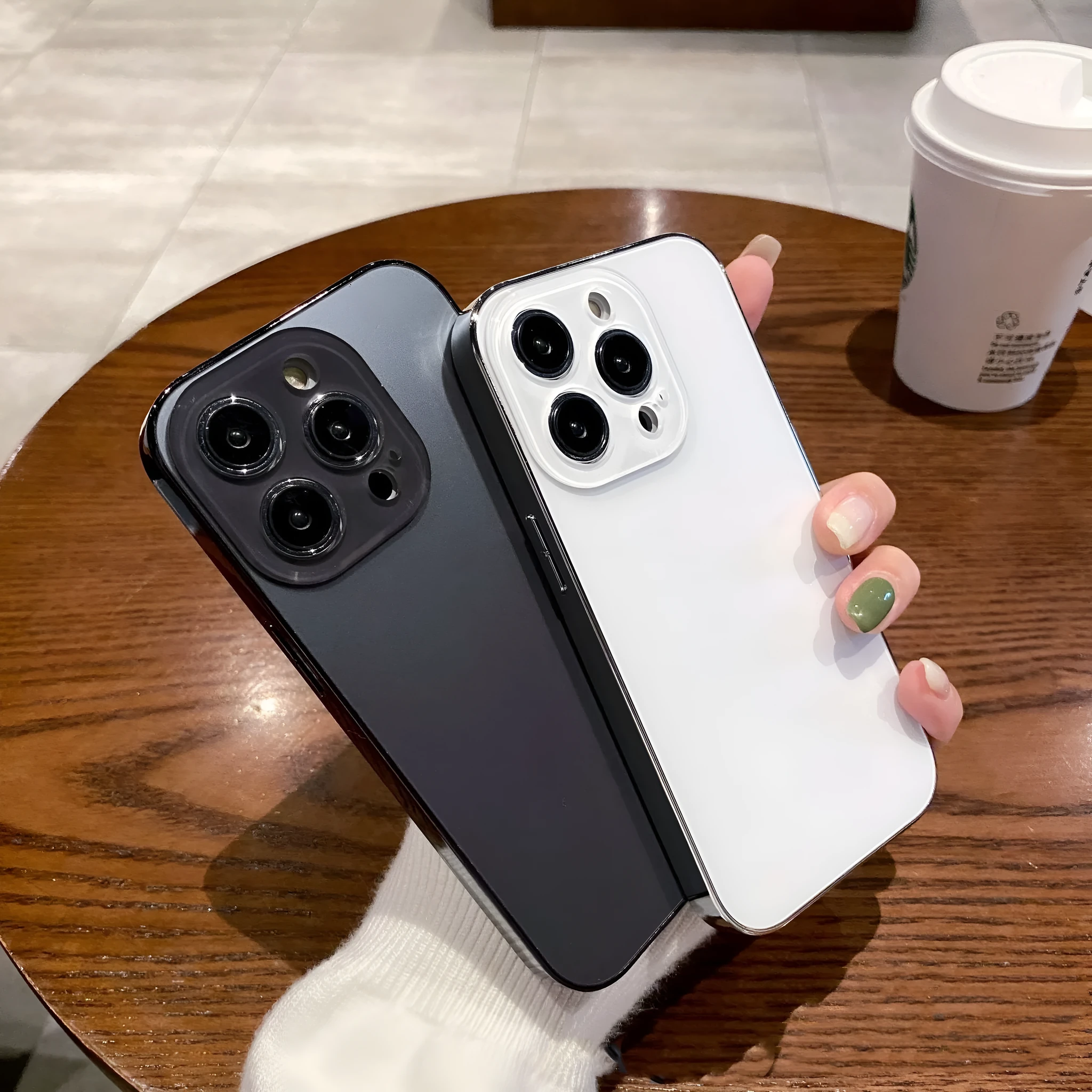 Electroplated TPU frosted acrylic phone case with matte finish for iPhone 11-14 series, showing black front and back against a neutral background