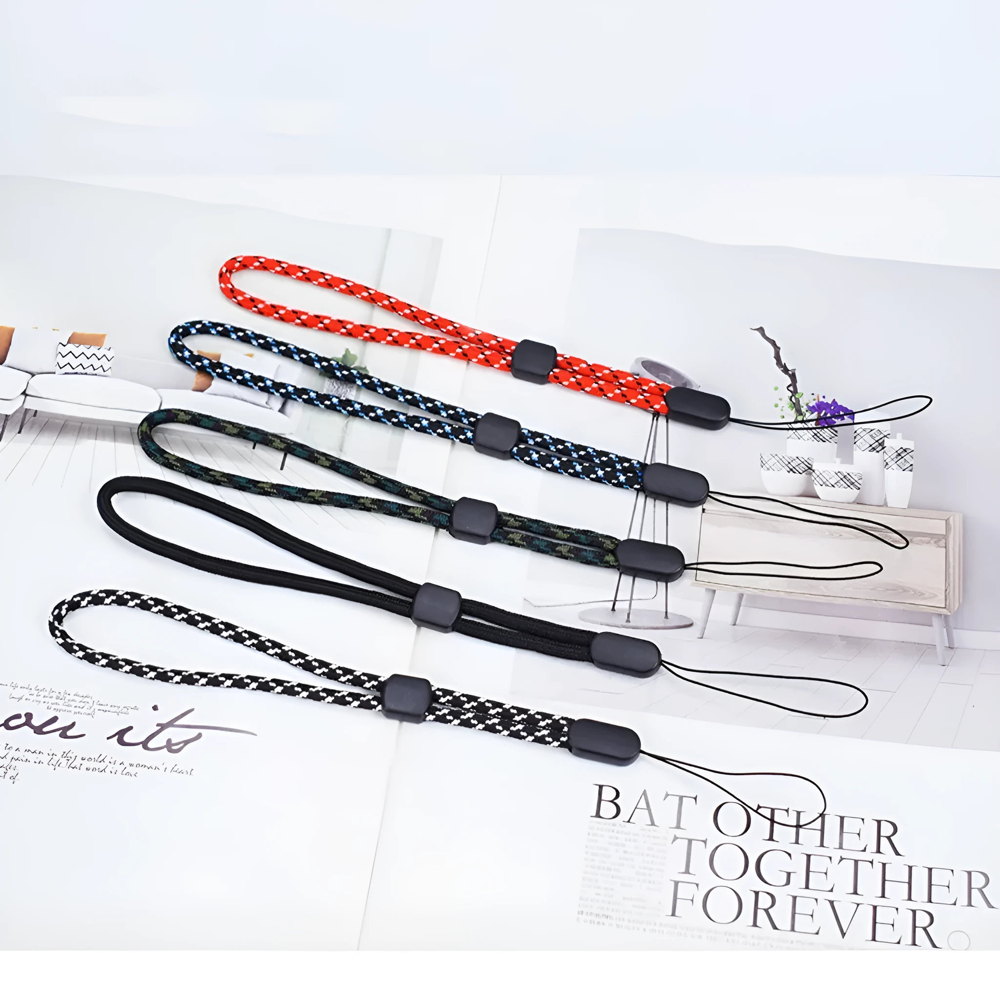 Woven nylon mobile phone lanyard wrist strap in pure black, 20cm length, unisex design