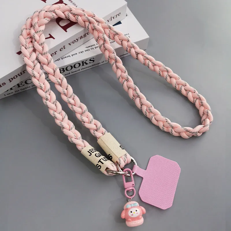 Woven nylon crossbody phone lanyard with macaron pendant in Pink Dot Gray, showing three-strand horse tail detail and matching clip.