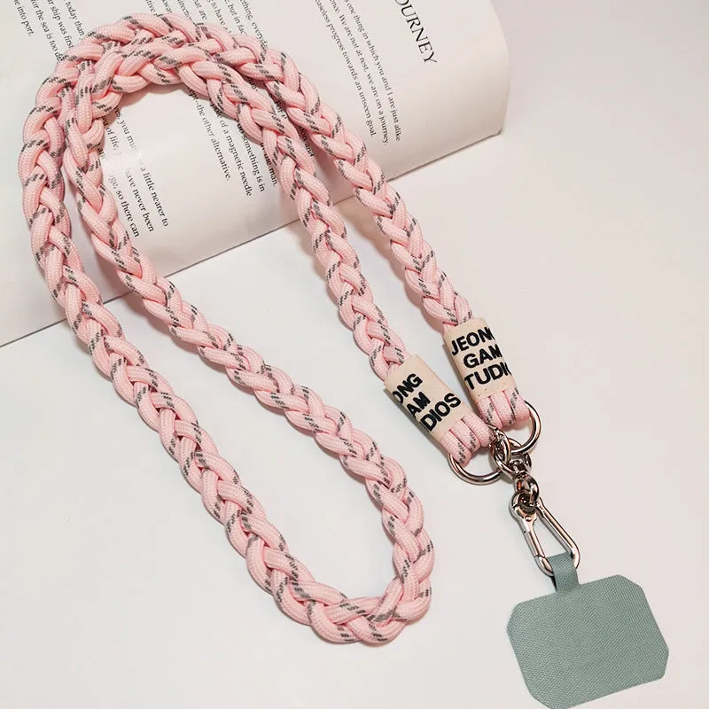 Woven nylon crossbody phone lanyard with macaron pendant in Pink Dot Gray, showing three-strand horse tail detail and matching clip.