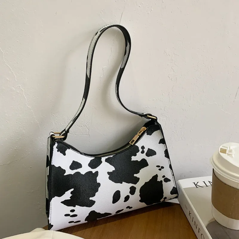 Women's small square PU underarm bag in multiple colours including leopard print, beige, and black.