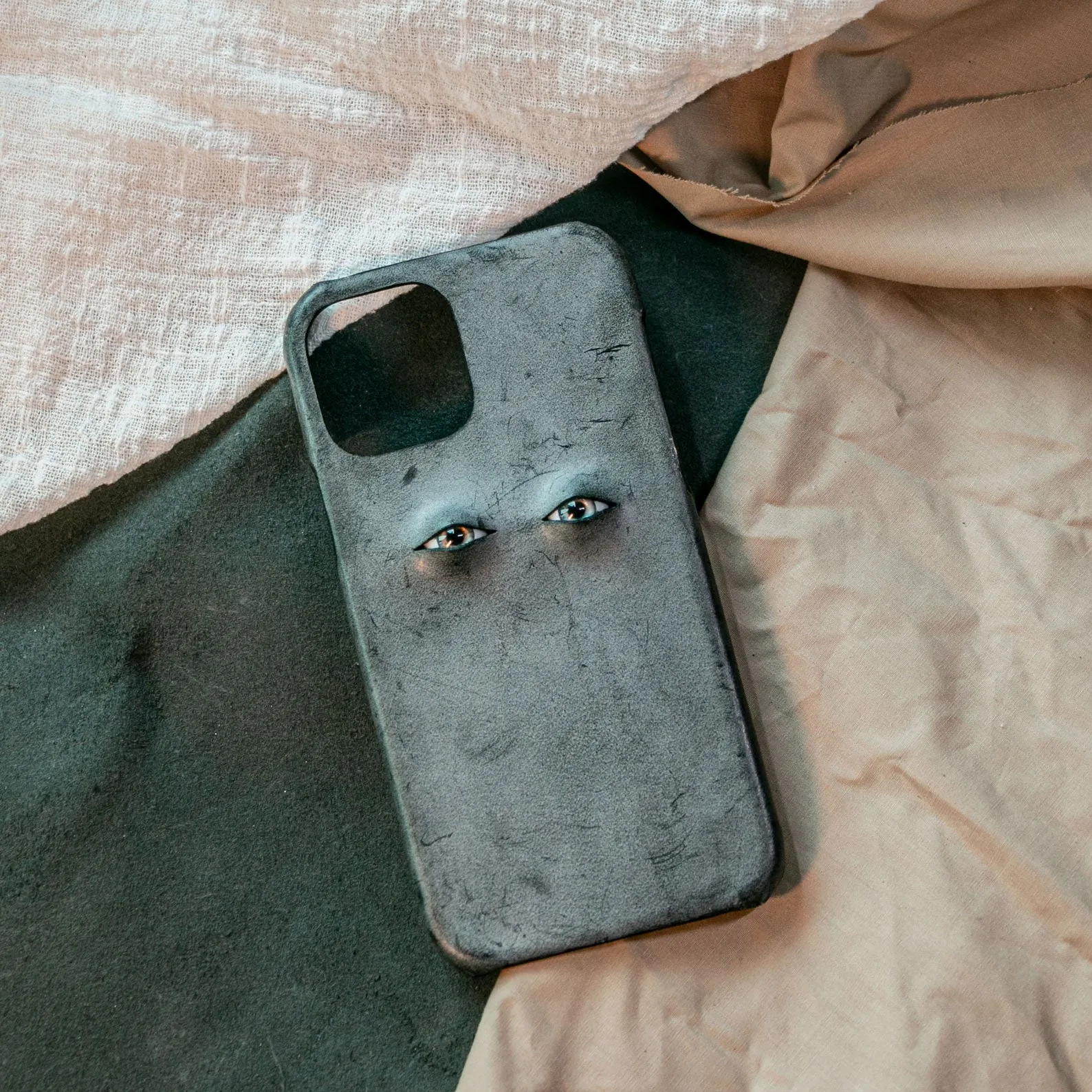 Vintage distressed cowhide leather phone case with textured grip, compatible with iPhone models 15 to 8 Plus, single eye style
