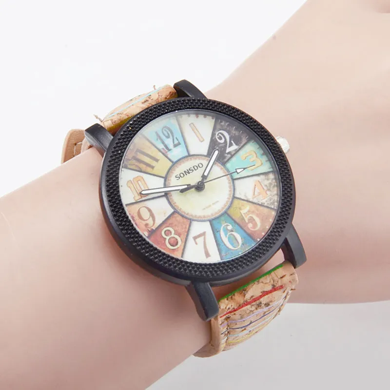 Vintage leather women's quartz watch showing 37mm round dial with tempered glass and stainless steel buckle