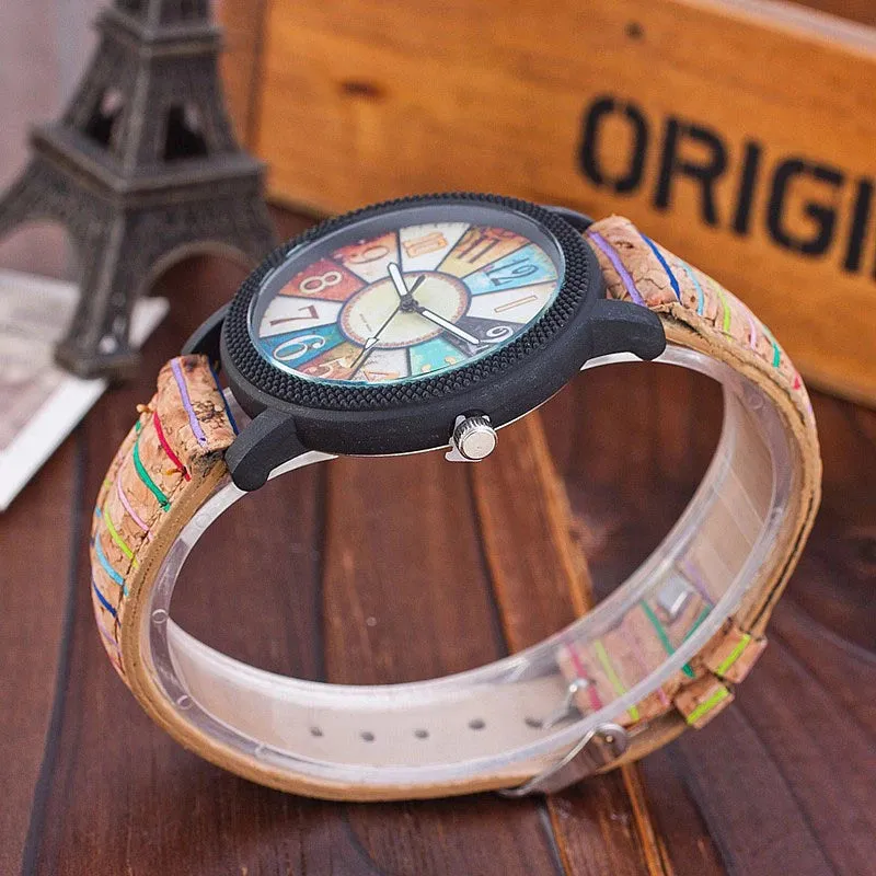 Vintage leather women's quartz watch showing 37mm round dial with tempered glass and stainless steel buckle