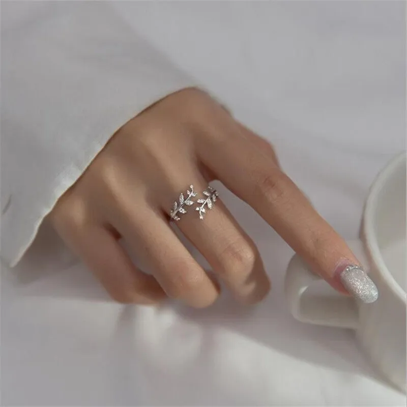 Leaf-shaped copper fashion ring with electroplated gold or silver finish for women