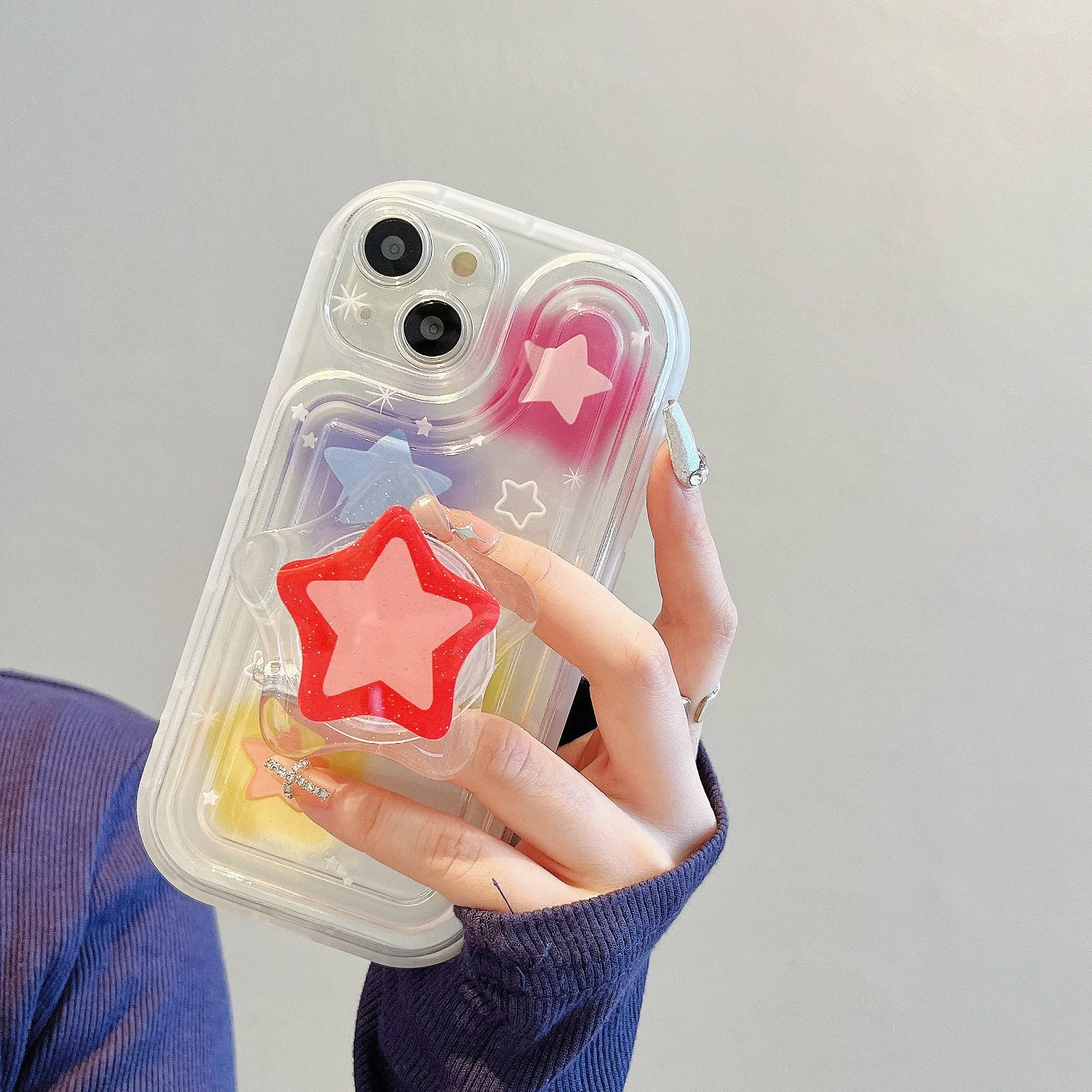 Blooming color TPU phone case with built-in bracket on an iPhone, showing airbag edge design