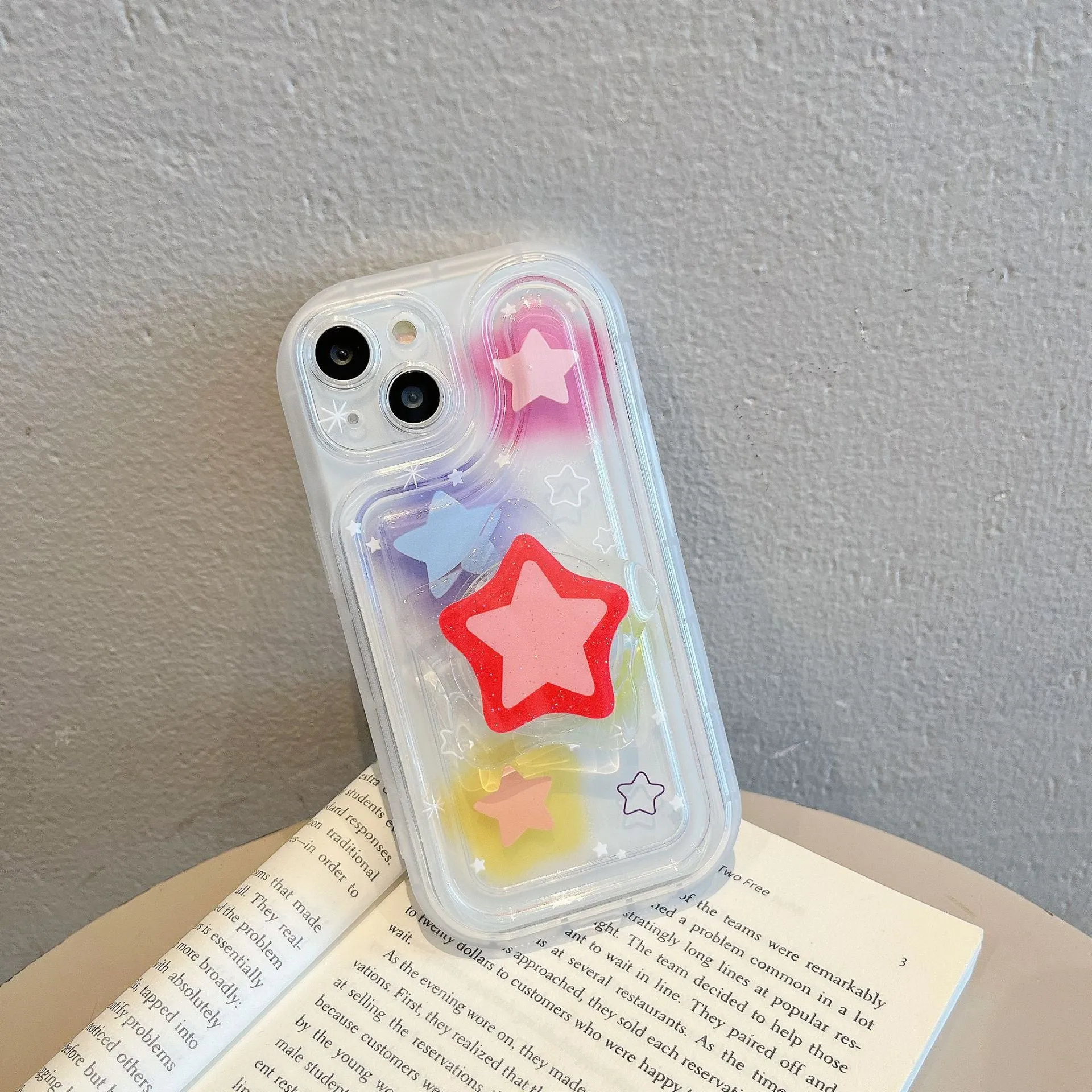 Blooming color TPU phone case with built-in bracket on an iPhone, showing airbag edge design