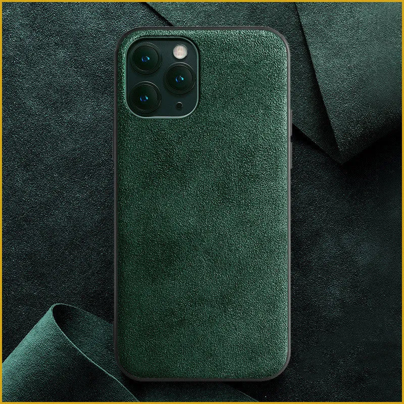 Suede iPhone case in dark blue colour showing full-cover protection and precise cutouts for ports and camera.