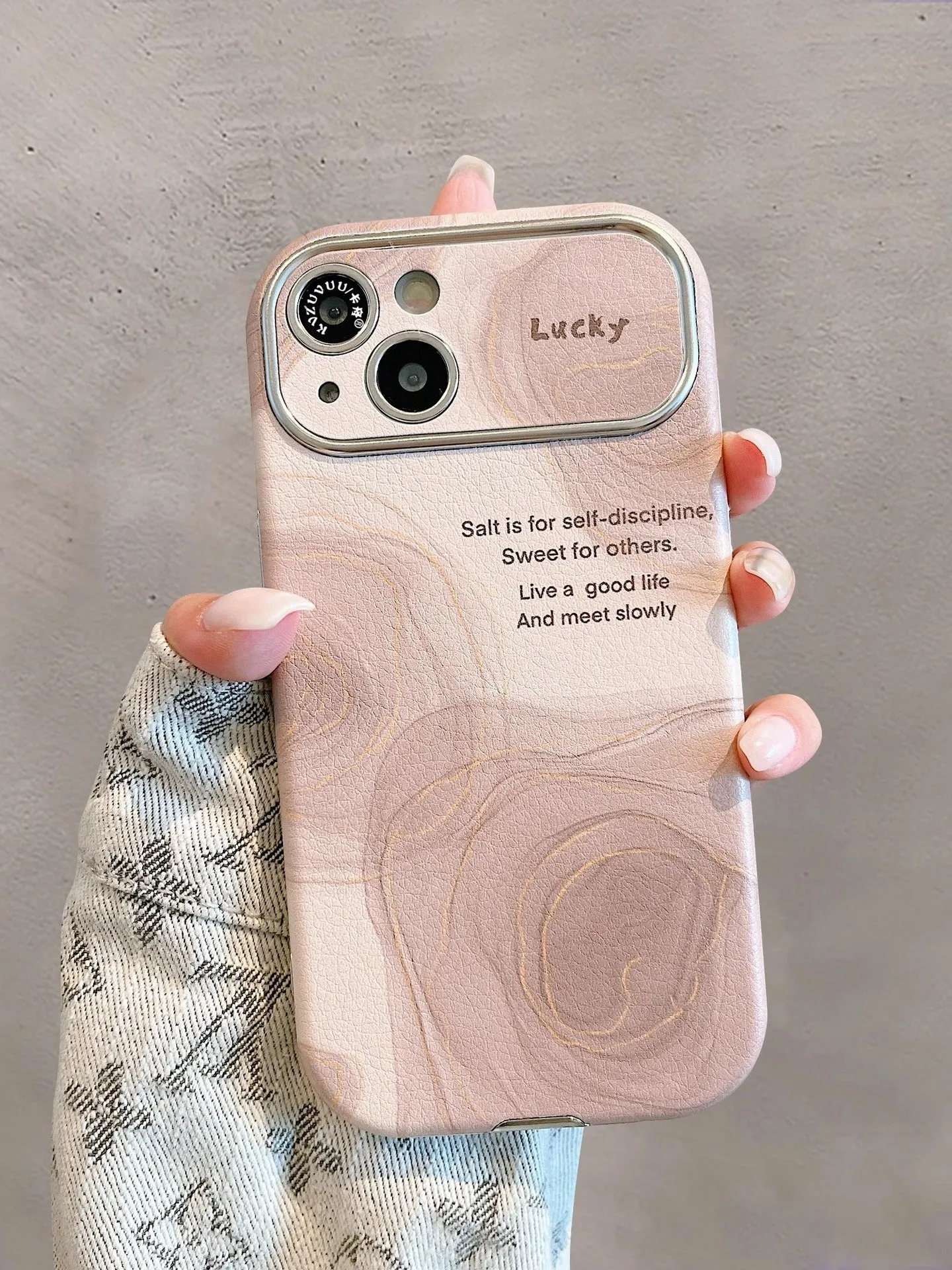 Large window lambskin silicone phone case in coffee colour with three-dimensional relief pattern compatible with iPhone