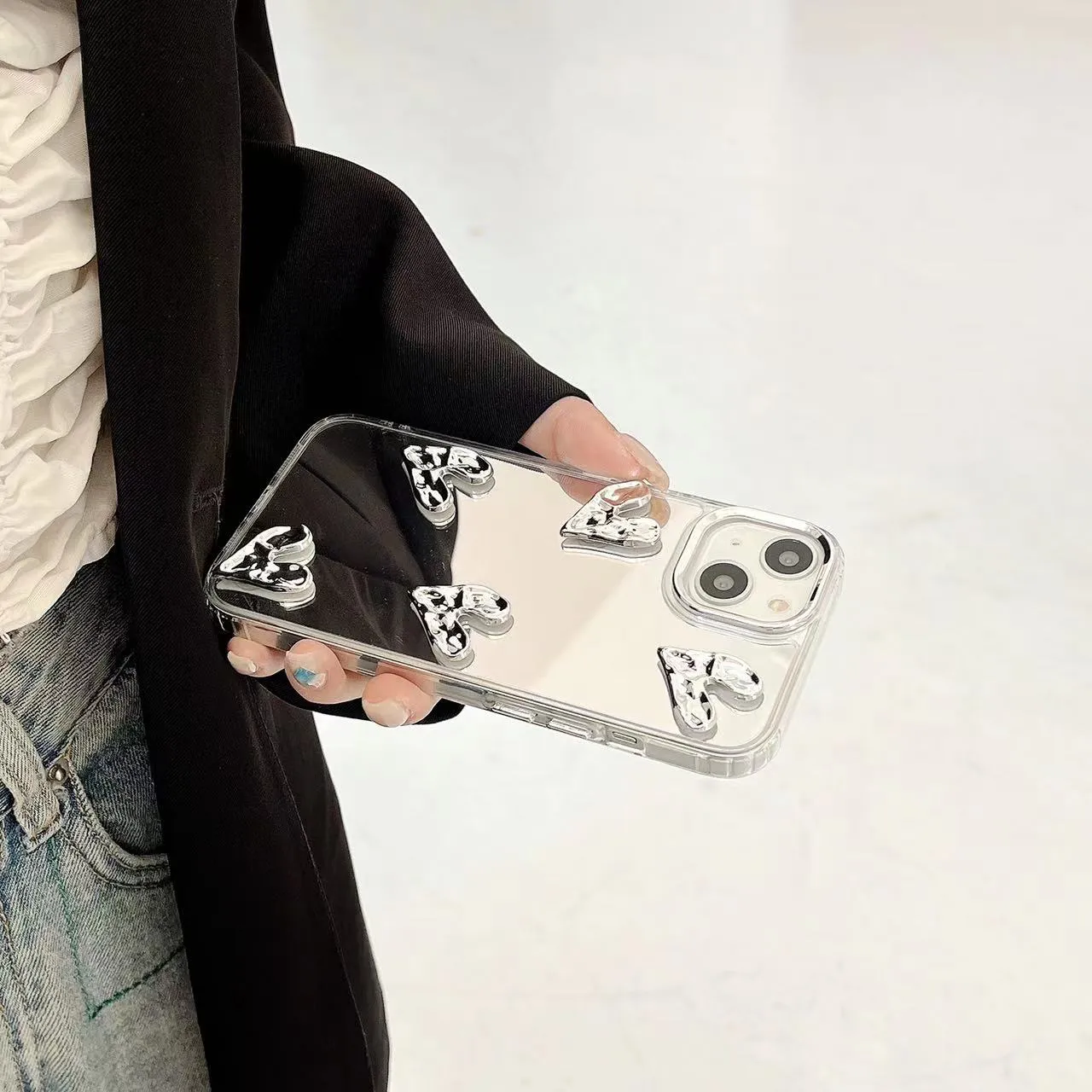 White electroplated mirror phone case for iPhone 14 Pro Max with three-dimensional love pattern and soft TPU construction