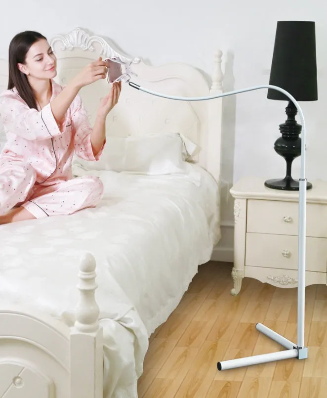Black and white mobile phone bed brackets and floor stands for bedside viewing
