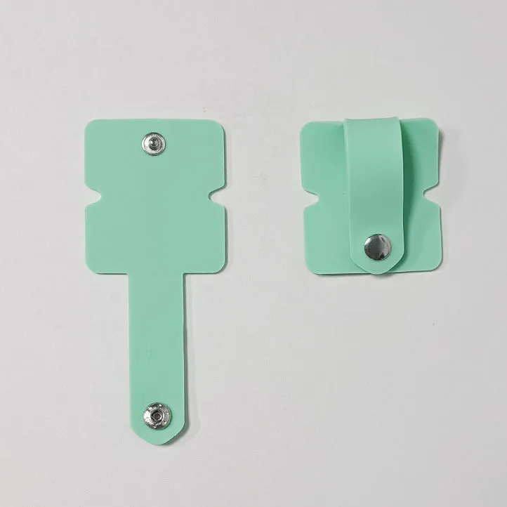 Small light green silicone button-closure storage bag for earphones and data cables measuring 5.5 by 5cm