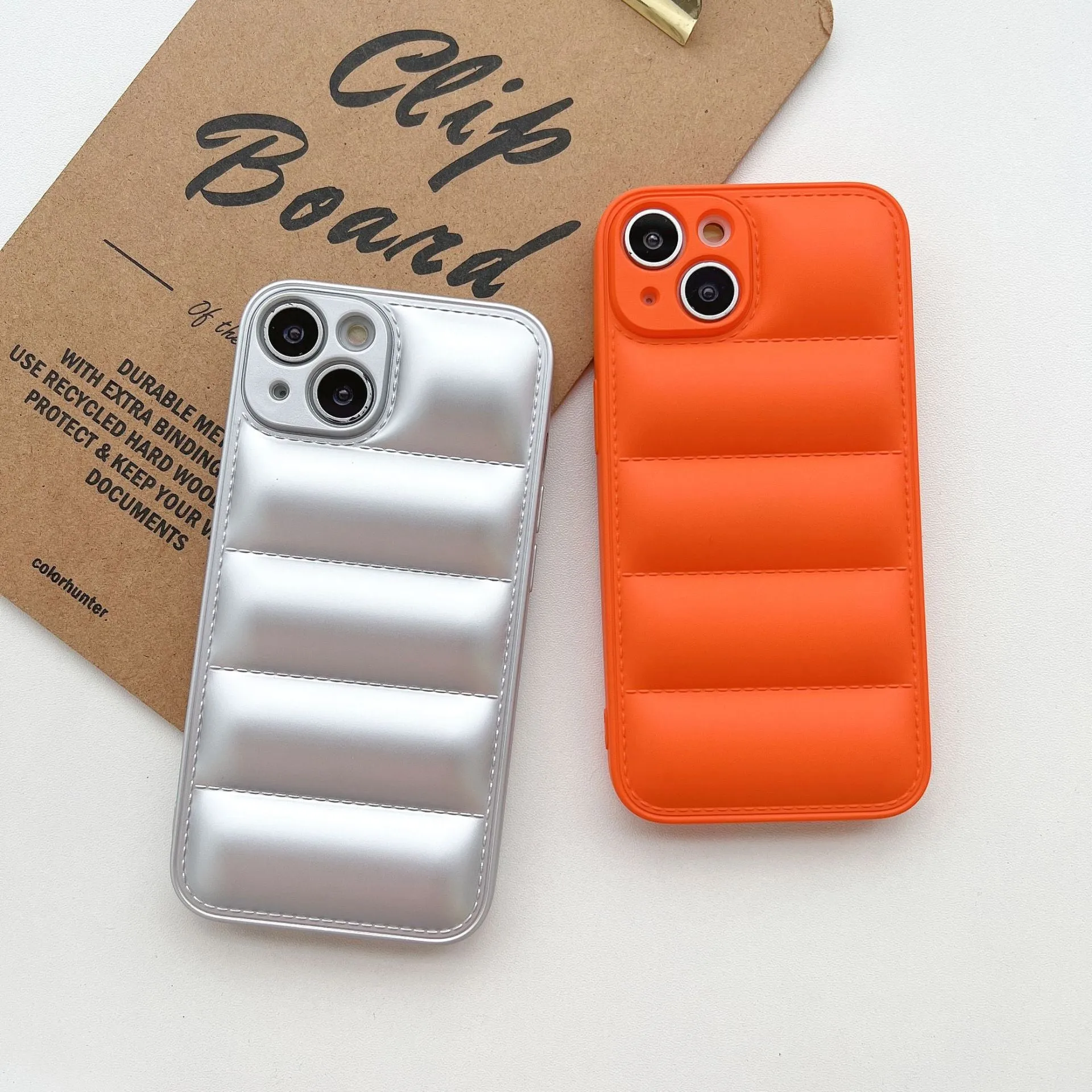 Plastic down jacket phone case for iPhone 15 series in black, shockproof TPU back cover