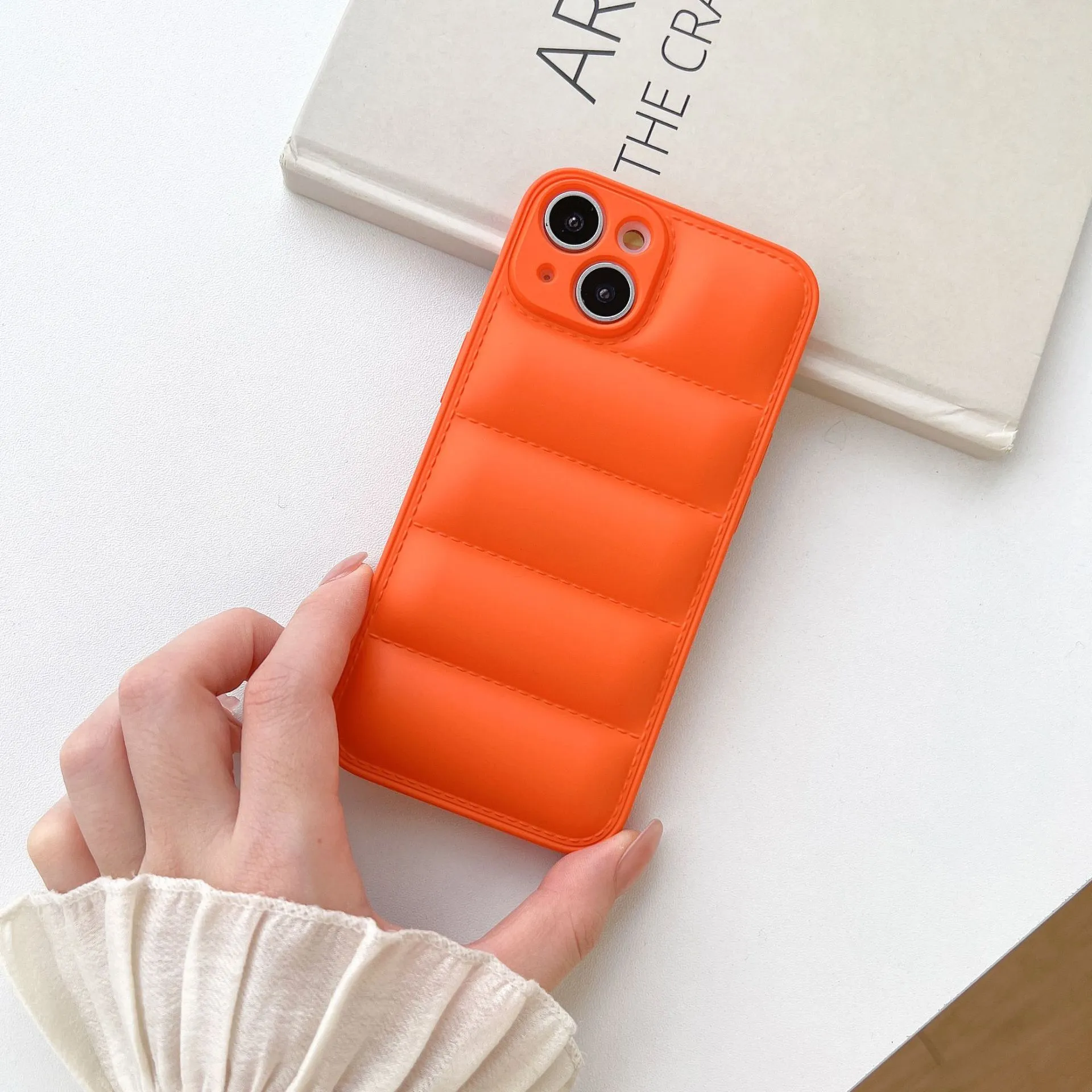 Plastic down jacket phone case for iPhone 15 series in black, shockproof TPU back cover