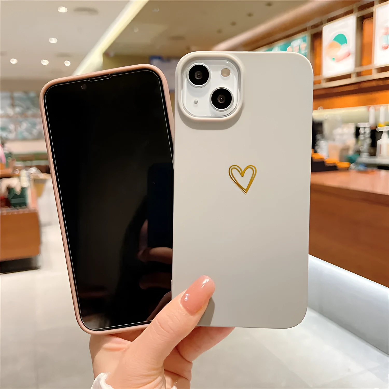 Brown soft silicone iPhone case featuring a hot stamping love heart design on the back.