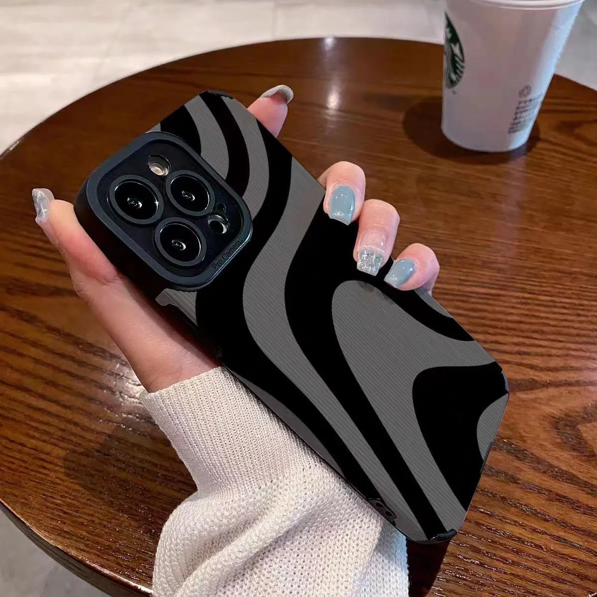 Dark zebra pattern silicone phone case with black imitation leather finish and shockproof protection for iPhone models