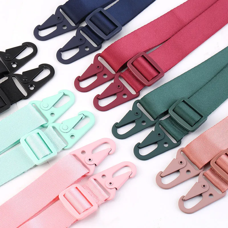 Black TPU buckle ribbon lanyard phone case protective sleeve with lanyard and opening for camera.
