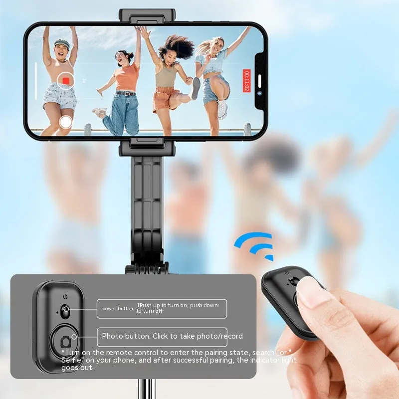 Black detachable desktop stand Bluetooth selfie stick extended to 1060mm with phone in holder