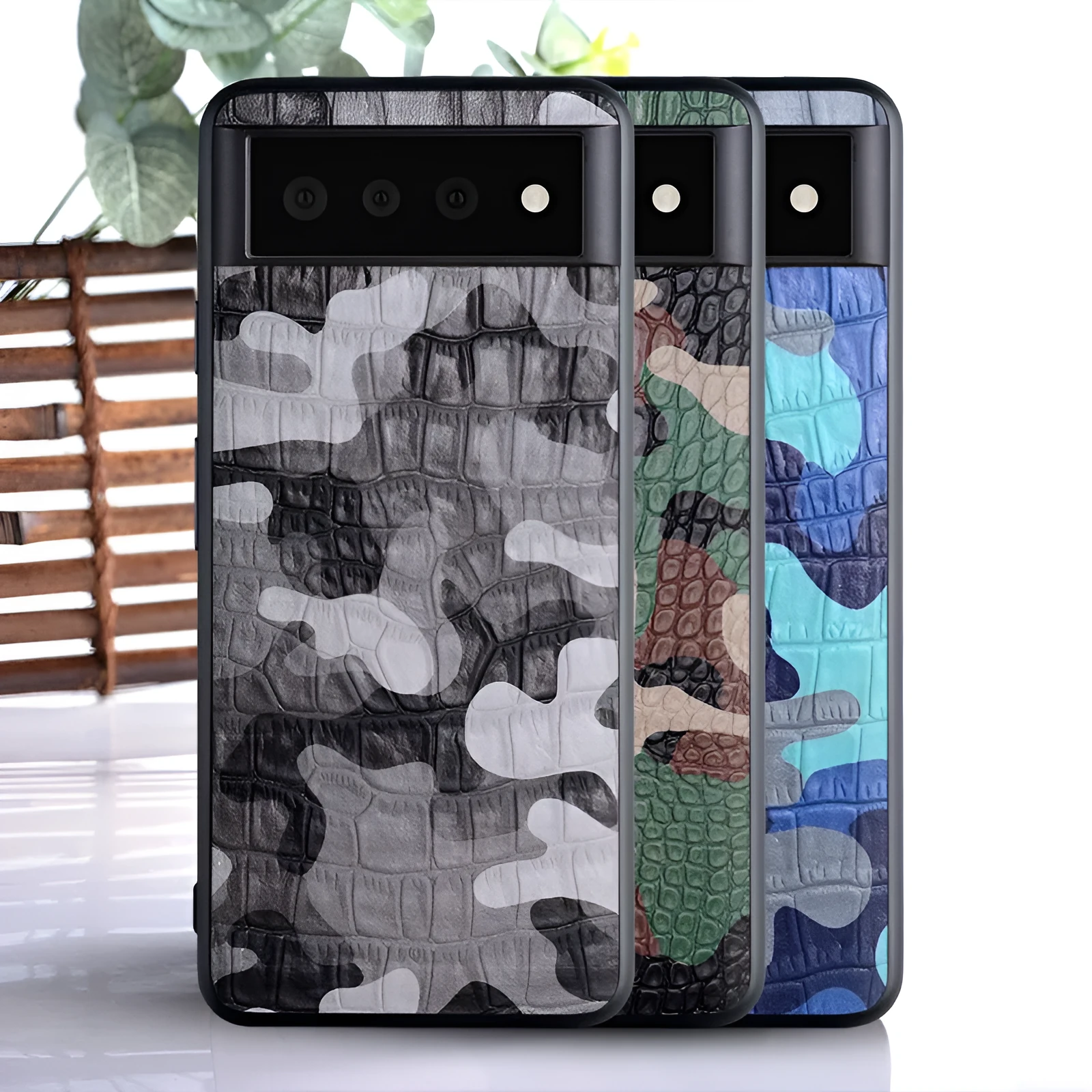 Camouflage PU back cover for Google Pixel phone, available in green, gray, blue, and orange, textured grip case