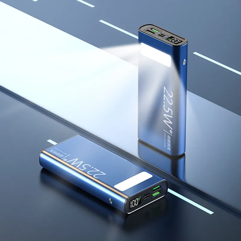 Black alloy power bank with LCD display showing battery level, featuring USB-A and USB-C ports.