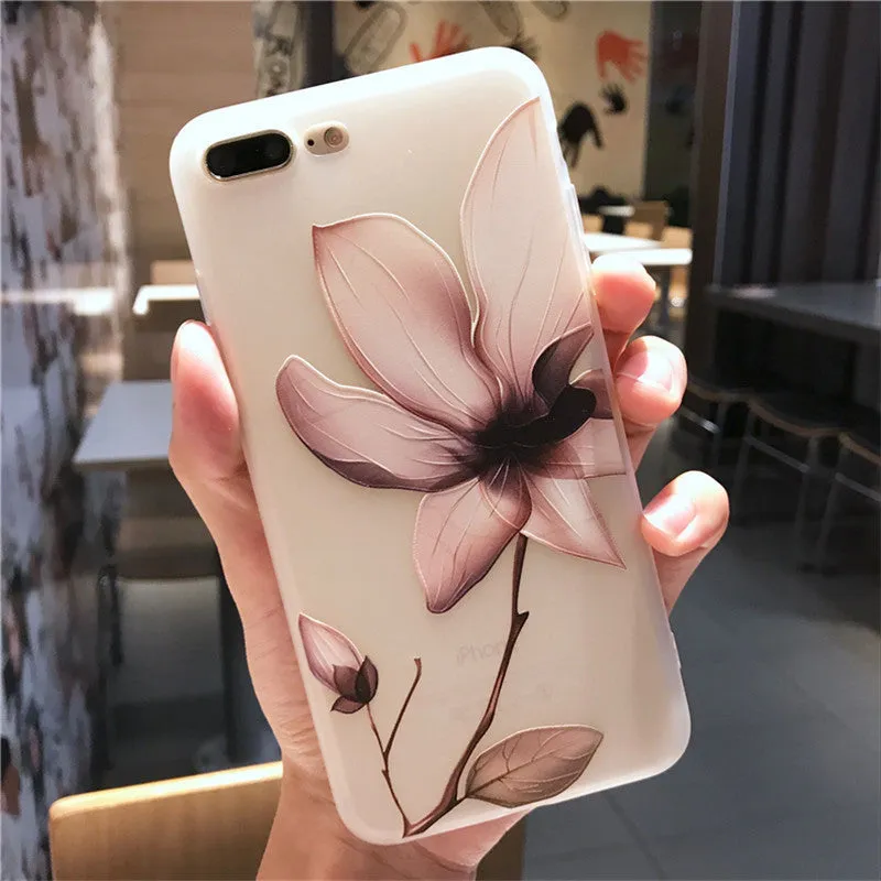 Black and white iPhone TPU cases with a raised embossed floral pattern on the back.