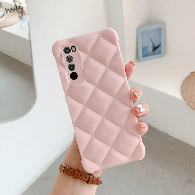 A solid-colour silicone back cover case for Huawei smartphones on a table.